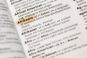Afrikaans gaan voortleef deur keuse, nie beleid