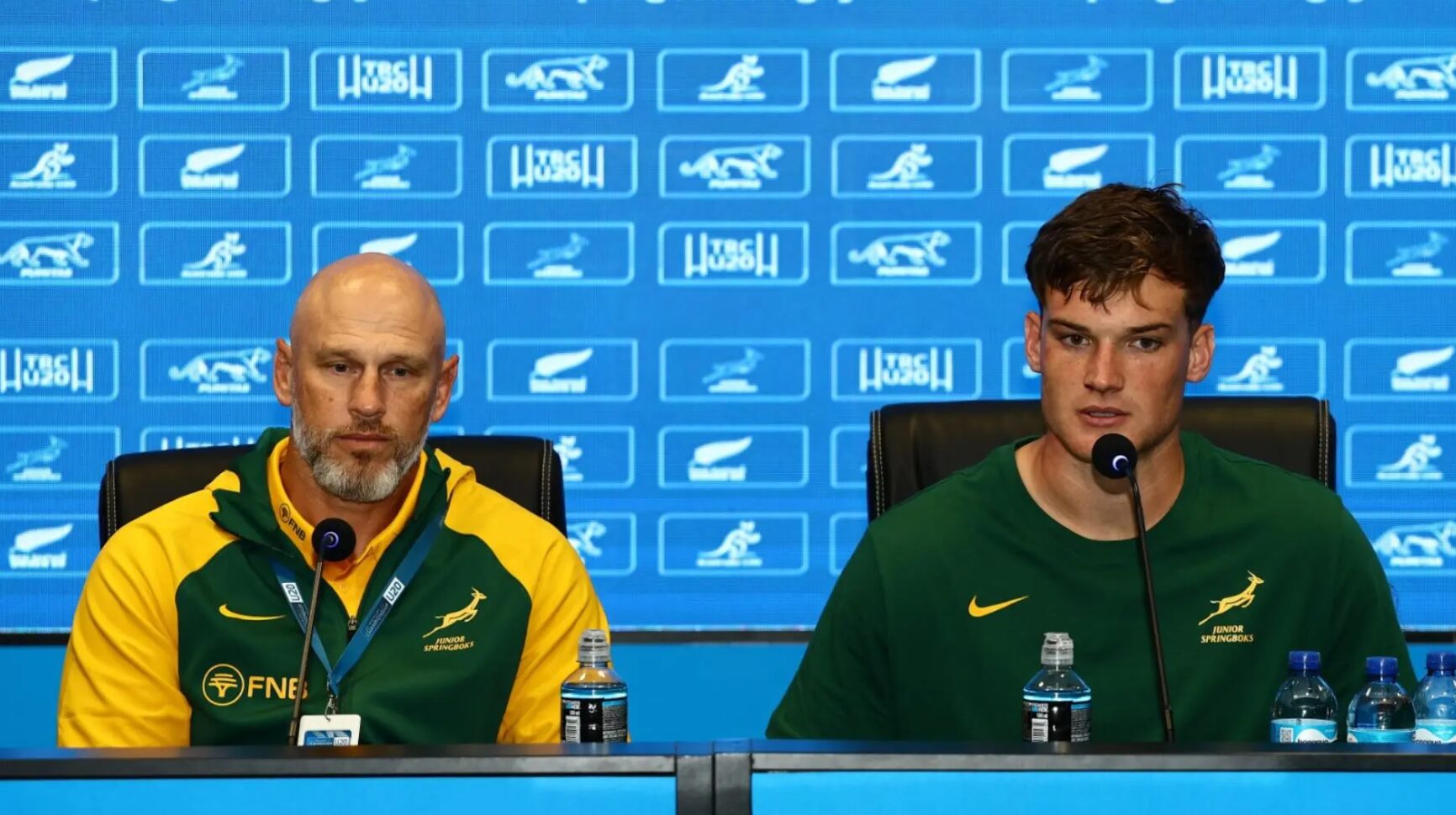 Junior Bok-breier, Kevin Foote, en kaptein Riley Norton.
