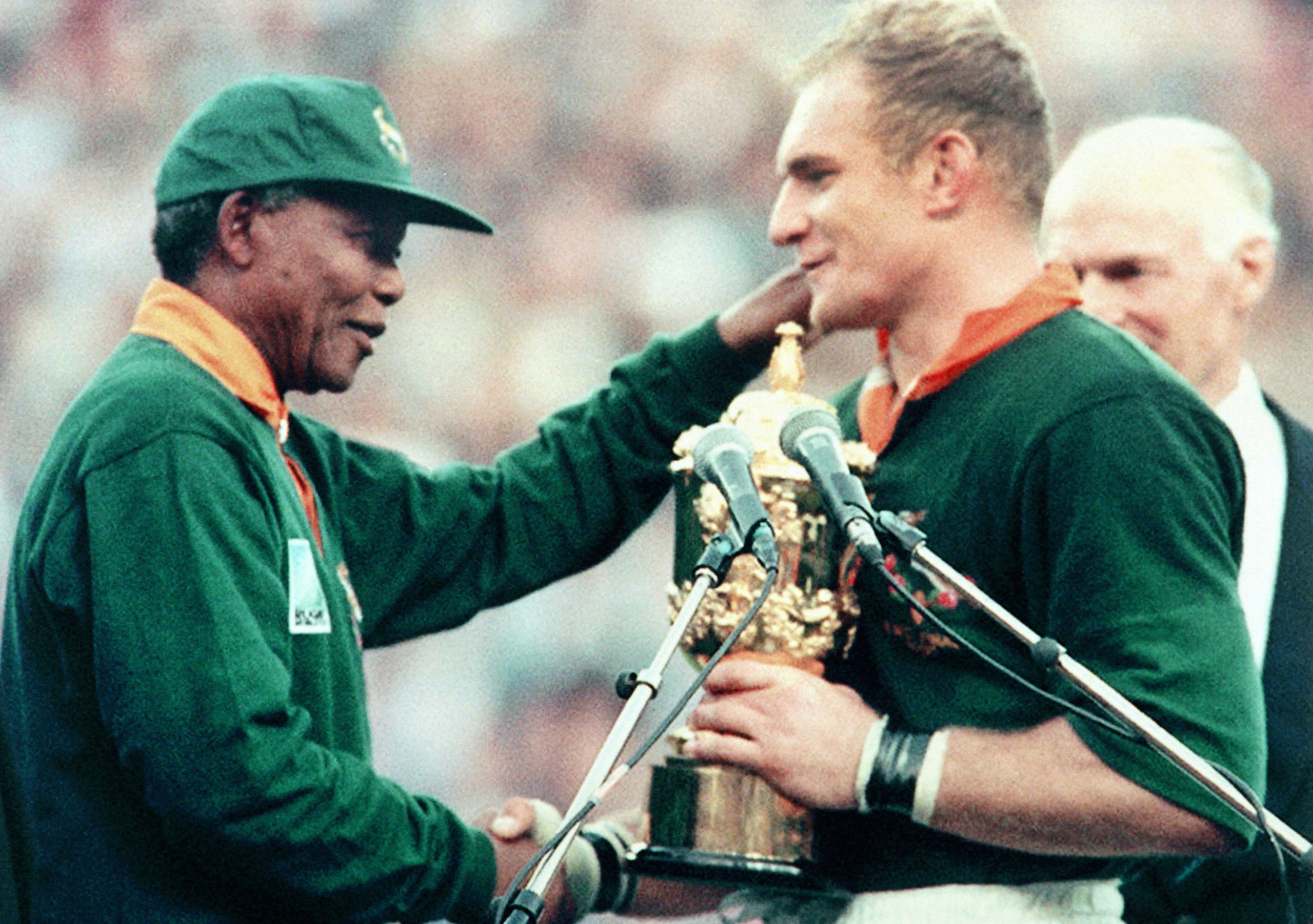 Springbok-legende Francois Pienaar en destydse president Nelson Mandela.